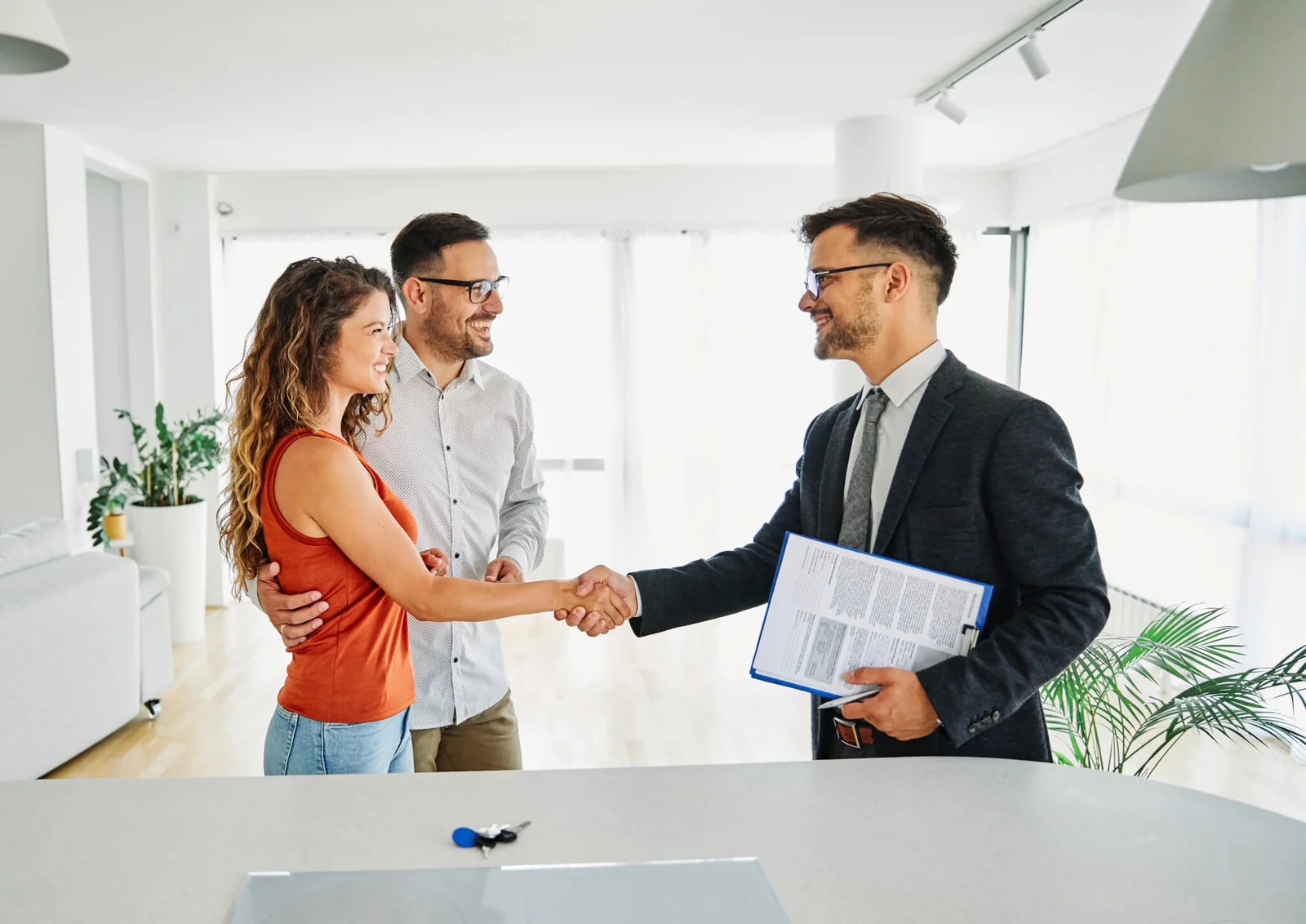 couple-man-deal-woman-contract-business-agent-agreement-estate-investment-consultant-meeting.webp